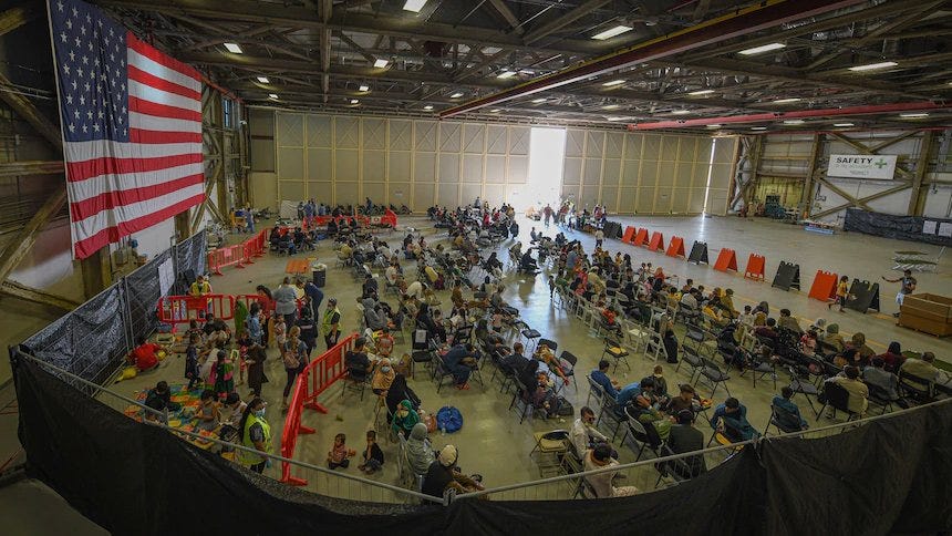 U.S. military flights take Afghan evacuees from Italy to America