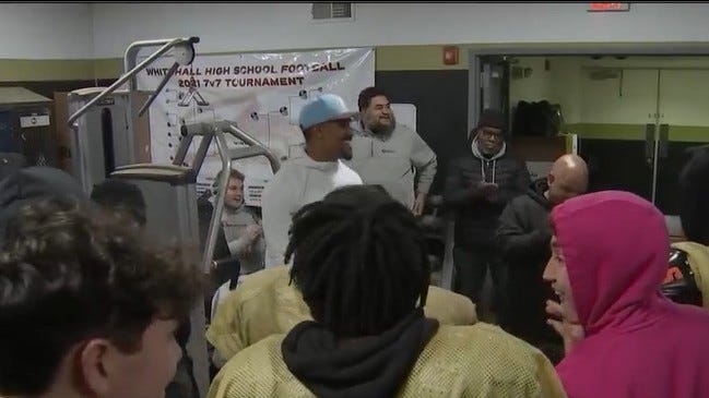 Jalen Hurts surprises Neumann-Goretti football team with visit