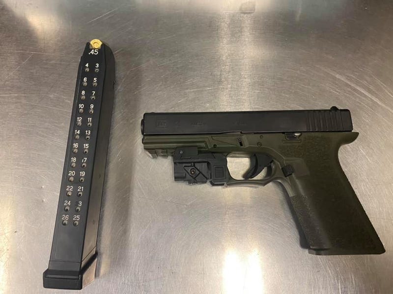 In one incident Sunday, police recovered a loaded .45 caliber semi-automatic handgun equipped with a 26-round magazine.