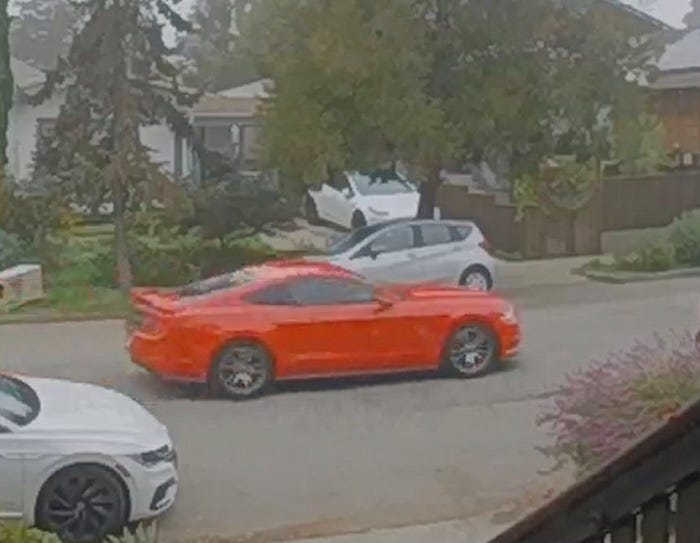 Police believe the suspect is driving a red Ford Mustang Fastback with a rear spoiler and dark tinted windows.
