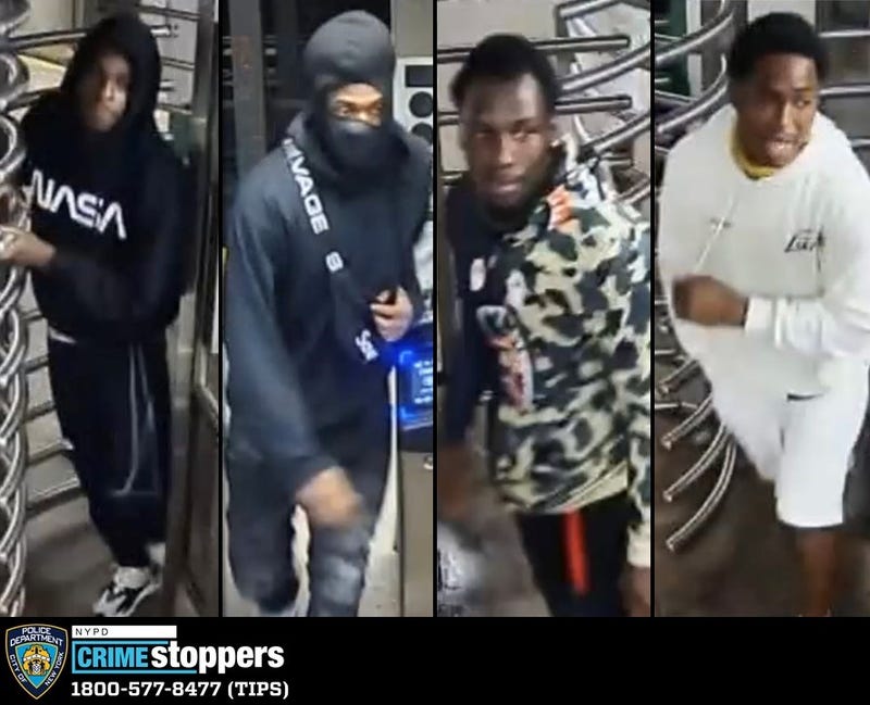 Police are searching for four suspects in Sunday's attack on an F train near the Carroll Street station
