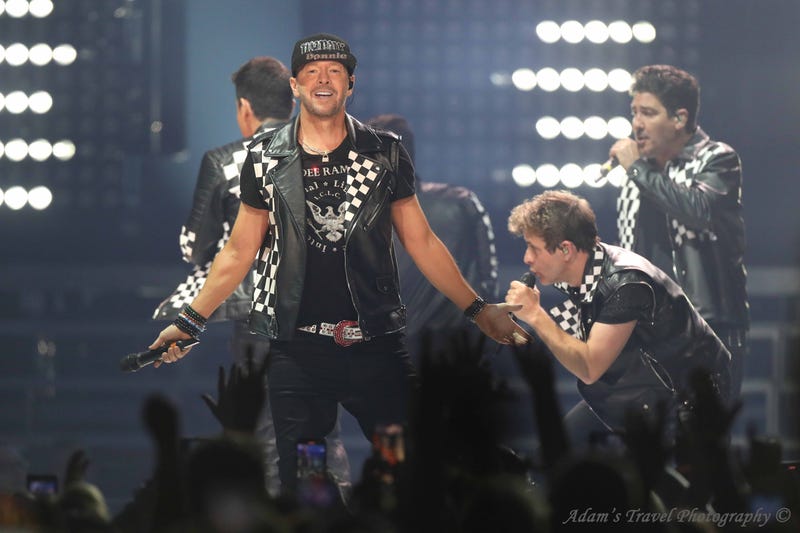 Multiple members of New Kids on the Block on stage