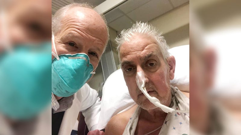 Dr. Bartley Griffith takes a selfie photo with patient David Bennett