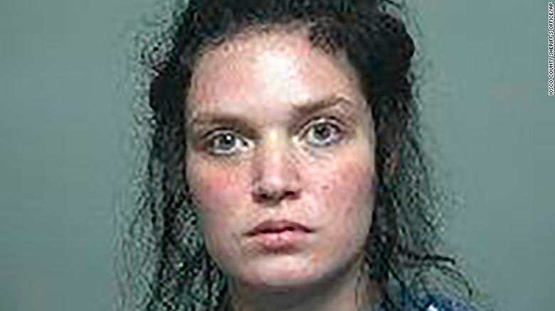 A 22-year-old mother told Child Protective Services that she was threatened and made to kill her 3-year-old daughter by voices in her TV while watching a cartoon, according to a police report obtained by CNN.
