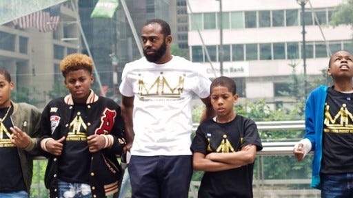 Vincent Garrett stands with a few of his students.