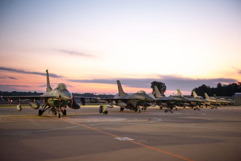 U.S. Air Force F-16 Fighting Falcons sit on the flightline of the Ohio National Guard’s 180th Fighter Wing, in the early morning hours, during a large-scale readiness inspection, Aug. 8, 2022, at the base in Swanton, Ohio.
