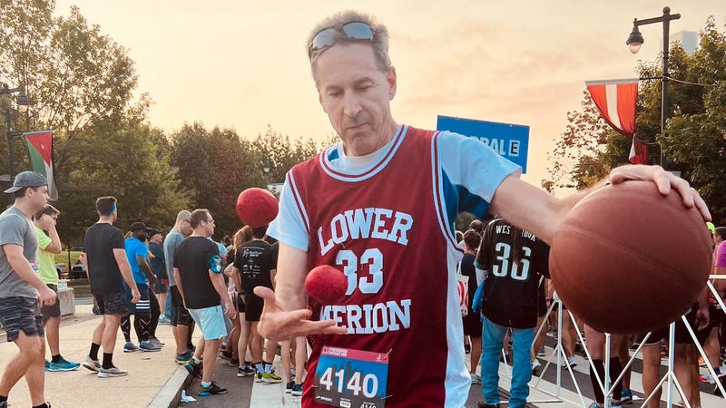 Barry Goldmeier, from Rockville, Maryland, juggled and dribbled as he ran the 2022 Philadelphia Distance Run on Sunday, Sept. 18.