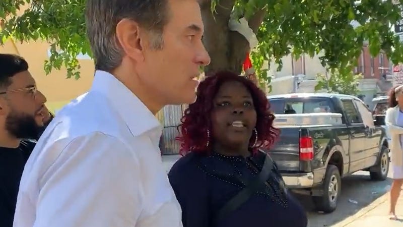 Republican U.S. Senate candidate Mehmet Oz with Sheila Armstrong, who was described as a community activist during an event she hosted in Philadelphia last month. It had not been disclosed that she was a paid coordinator for Oz's campaign in Philadelphia.