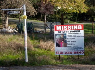 In this Nov. 10, 2016, file photo, a "missing" sign for Redding, Calif., resident Sherri Papini is seen near the location where the mother of two is initially believed to have gone missing while jogging. In March 2022, Papini was arrested on charges of faking her own kidnapping in 2016. She signed a plea deal on Tuesday, April 12, 2022 , in which she will plead guilty of lying to a federal officer and mail fraud, her attorney, William Portanova, first told The Sacrament Bee.
