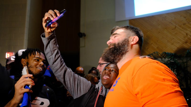 Philadelphia Eagles center Jason Kelce poses for selfie with George Washington High School students.