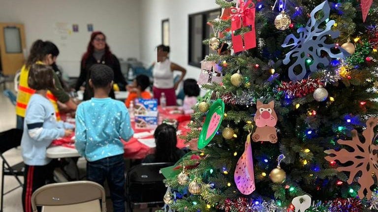 Children who arrived with migrant families in Philadelphia on Dec. 24 participate in Christmas activities at the welcome center in North Philadelphia.