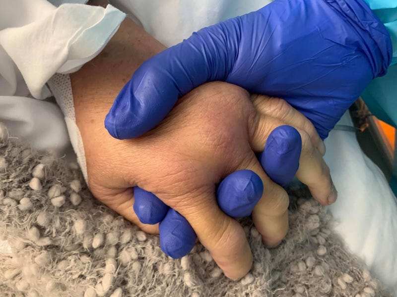 As Kim Maginn took her final breaths, her daughter Rachel Rosser was holding her hand.