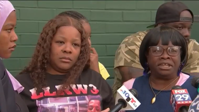 From left: Roland Darrel White's sister, mother and grandmother spoke to reporters on Wednesday when a warrant was issued for the arrest of Neera Nicolas-Hudson.