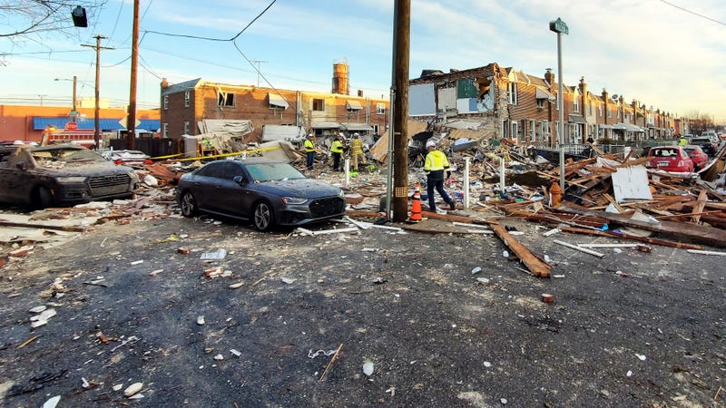 In the early hours of New Year’s Day, investigators say, a gas leak likely caused an explosion on the 3500 block of Miller Street that obliterated three row homes and damaged several others.