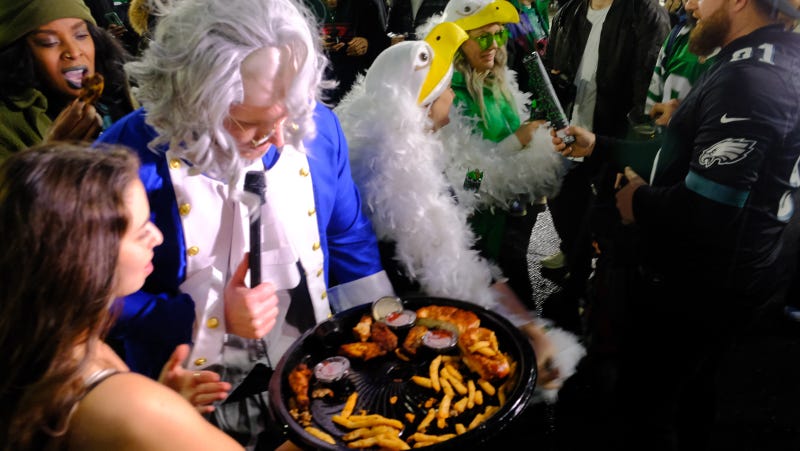 A "Ben Franklin" character holding snacks after the Philadelphia Eagles' 38-35 loss to the Kansas City Chiefs in Super Bowl LVII.