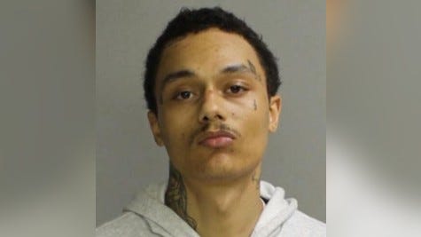 Tamir Hartsock, 23, is accused of illegally gun trafficking. Authorities say some of those guns went on to be used in homicides and other violent crimes.