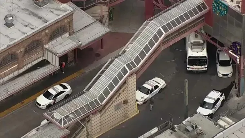Police cars surround the Arrott Transportation Center in Frankford on June 15, 2023, after a SEPTA guide was shot in the leg while aboard a Market-Frankford Line train.