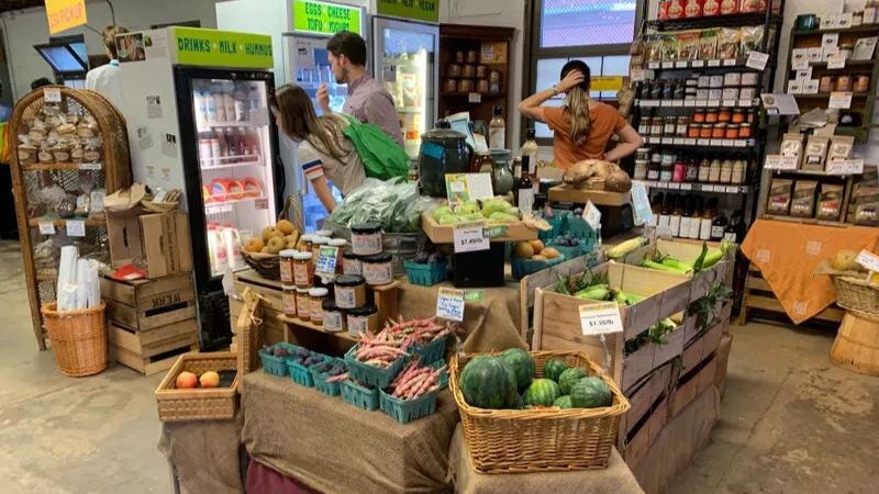 Working at this farmers market is part of the education experience for students at Saul Agricultural High School.