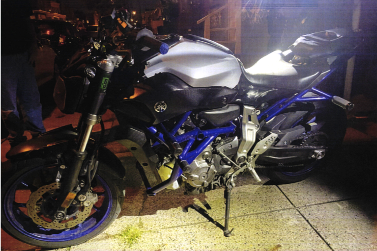 Police say they searched Cody Heron’s property and found the motorcycle, helmet, clothing and gun visible in the video of his confrontation with a driver on Sunday night.
