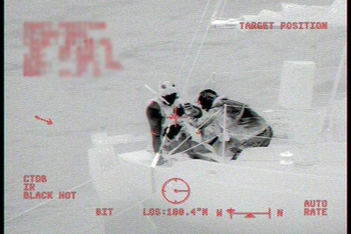First responders retrieve a 23-year-old woman from a sailboat off the Northern California coast.