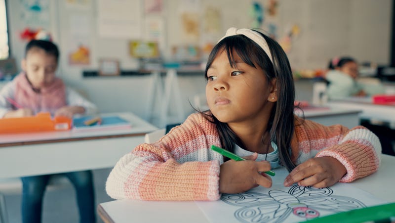 Girl demonstrating ADHD symptom