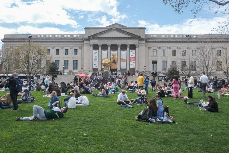 Hundreds turned out to view the partial eclipse at a free block party hosted by the Franklin Institute.
