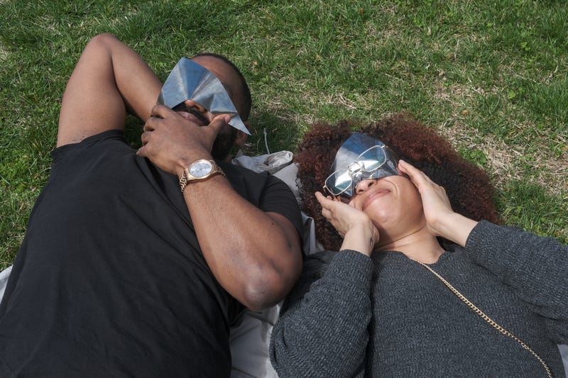 Korey and Mylon were given strips of film by Franklin Institute after they ran after eclipse glasses.