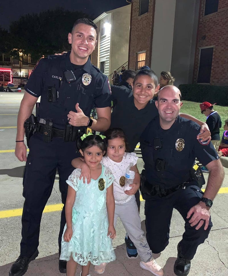 Carrollton PD images of Officer Nothem at National Night Out