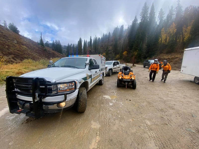 The Search and Rescue crew and multiple vehicles.