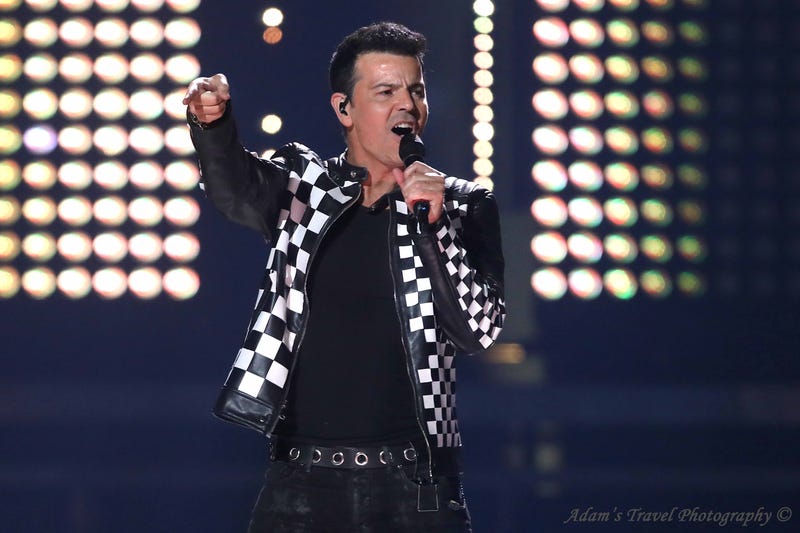 Man holding microphone on stage