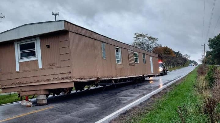 PHOTOS: Man arrested for abandoning mobile home in middle of Missouri road