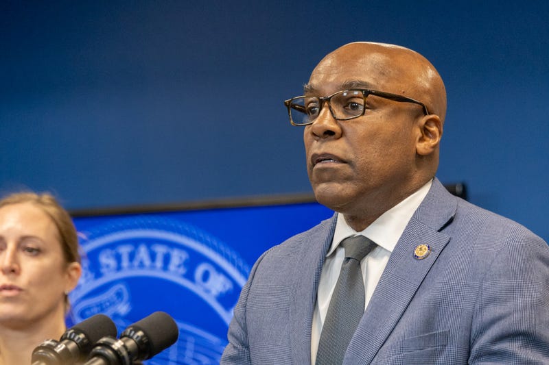 Illinois Attorney General Kwame Raoul discusses a lawsuit against the federal government at a news conference in January 2025