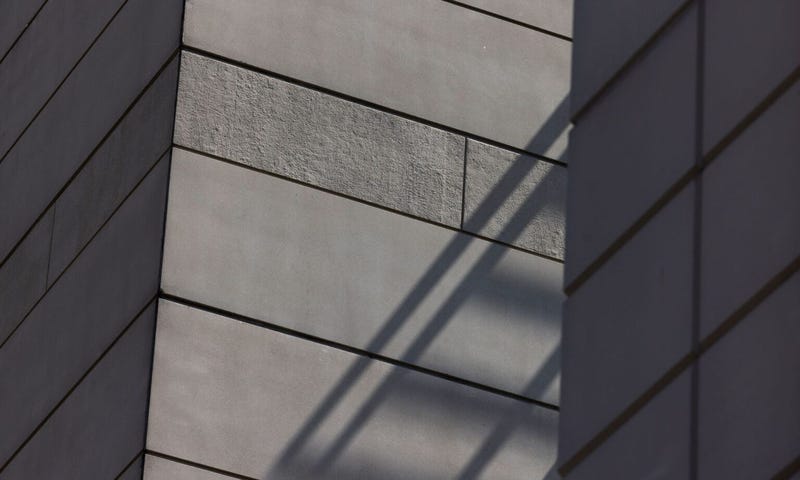 A photo shows shadows falling on the outside walls of a St. Louis jail building.