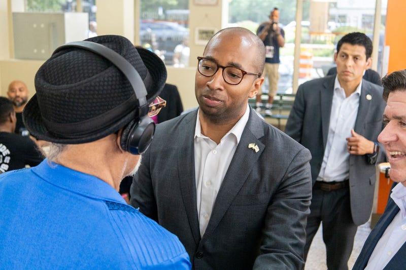 Christian Mitchell, Gov. JB Pritzker’s running mate, listens during a conversation at Peach’s Restaurant in Chicago’s Bronzeville neighborhood on July 2.