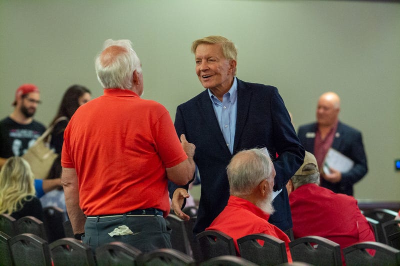 Attorney Bob Fioretti shakes hands at the Republican State Central Committee breakfast in Springfield. He’s running for attorney general in 2026.