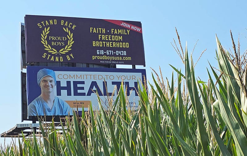 A billboard promoting the Proud Boys, a right-wing extremist group, appears in a cornfield in Clinton County, Illinois.