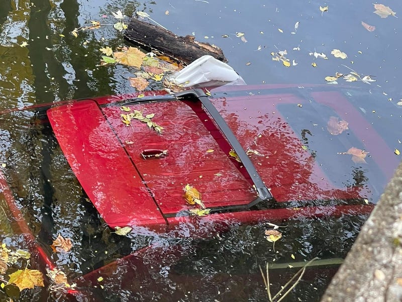 A submerged vehicle in Kennett Square. A police officer rescued the driver.