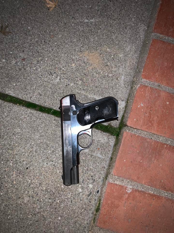 The handgun used by a man who charged at officers and was shot and killed.