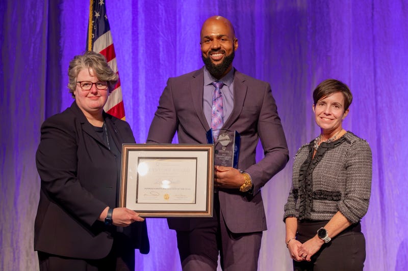 Leon Smith (center) was named the 2025 Pennsylvania Teacher of the Year.