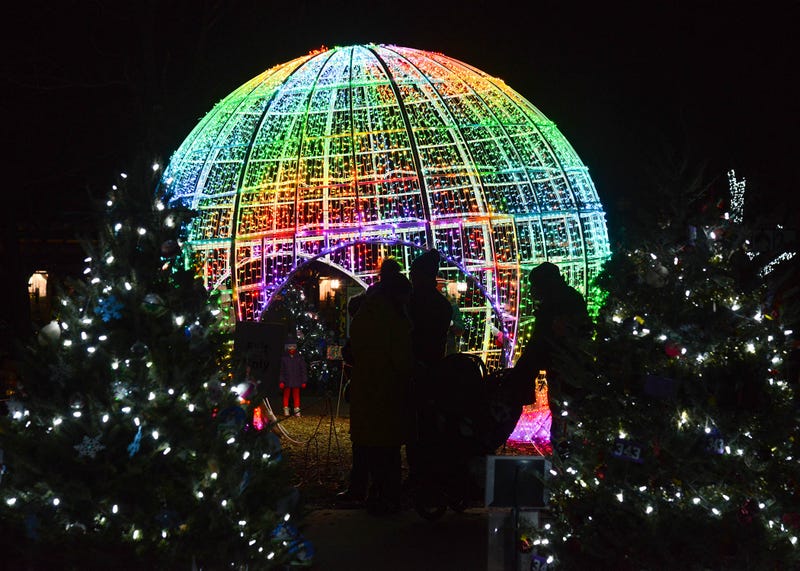 During Brookfield Zoo’s Holiday Magic®, guests can take memorable photos in the ever-popular dazzling giant orb.