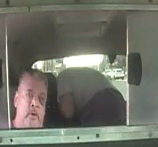 Two men inside a taxi in New Jersey. 