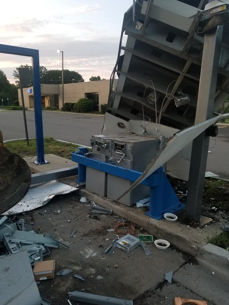 An elaborate plan to break into an ATM in a stolen excavator was thwarted by authorities after bank security caught the heavy equipment smashing into the cash machine early Saturday morning.