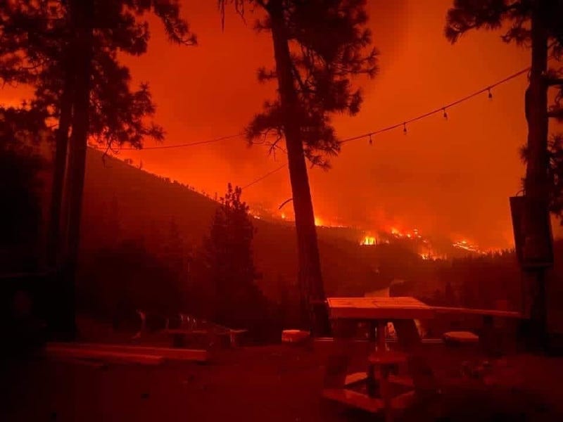 Amid a Red Flag Warning, a wildfire is raging in the northernmost part of California, destroying homes and forcing evacuations.