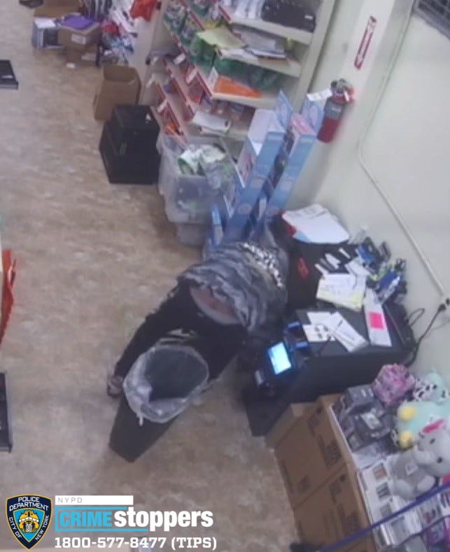 Burglar robbing Staten Island Family Dollar