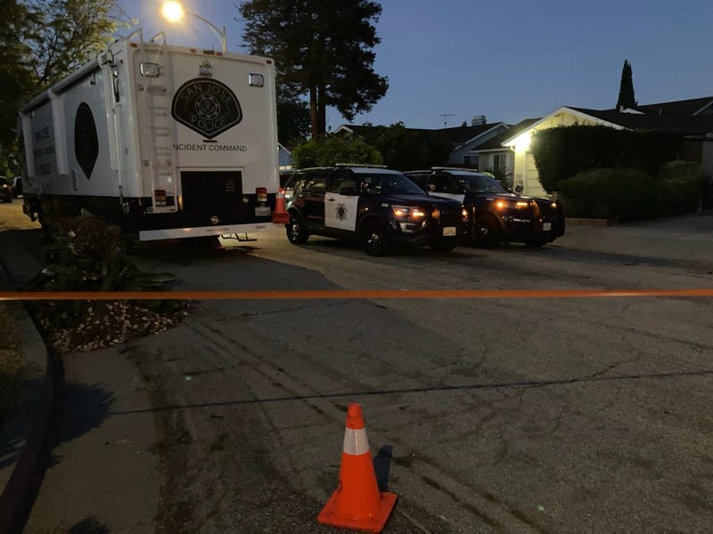 Police tape lines the Flickinger South neighborhood in San Jose early Monday.
