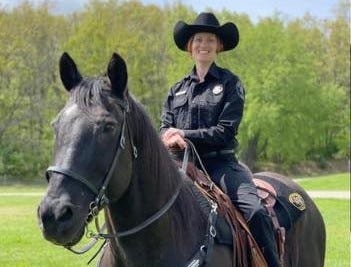 A blunder at a fair in West Michigan has severely injured a law enforcement member after she fell while getting off her horse -- and the horse presumably fell on top of her.