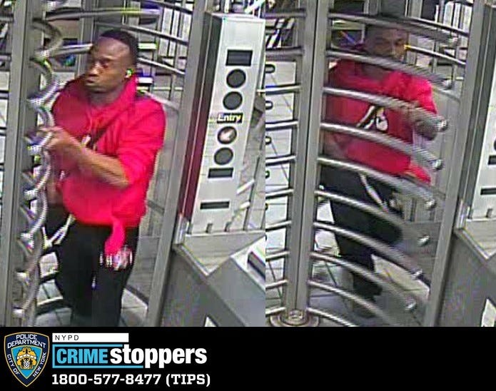 Police are searching for a man accused of punching another man in the face in an unprovoked attack at a Queens subway station over the weekend.