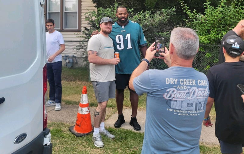 Fletcher Cox with Pat DiCrecchio's neighbors