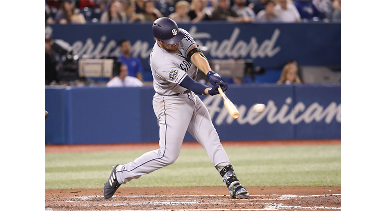 Hunter Renfroe #10 of the San Diego Padres hits a single in the fifth inning during MLB game action against the Toronto Blue Jays at Rogers Centre on May 25, 2019 in Toronto, Canada. (Photo by Tom Szczerbowski/Getty Images)