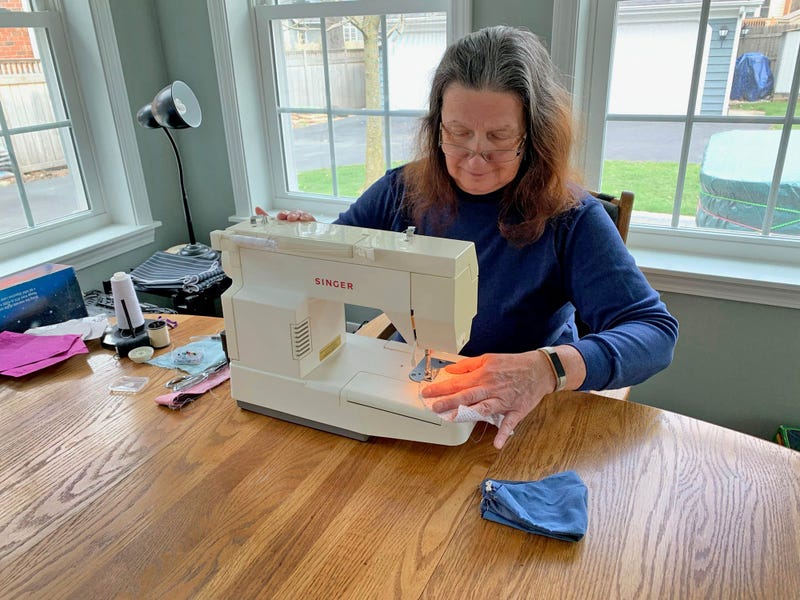 Cindy Blaszak of La Grange makes masks for the animal care staff at Brookfield Zoo.